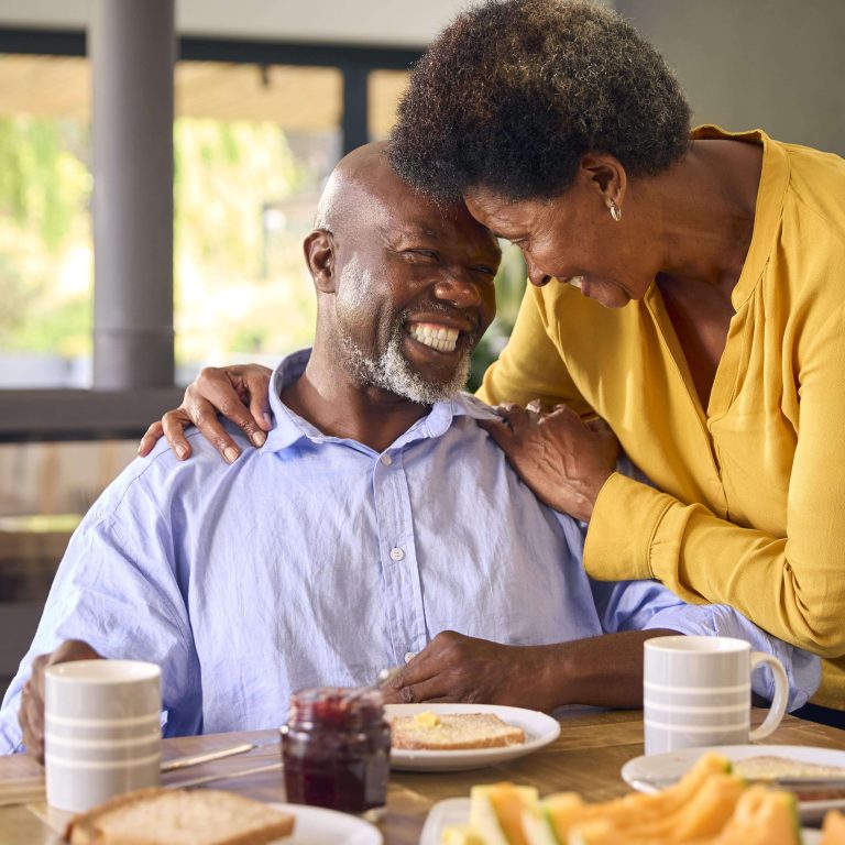 senior-couple-at-home-enjoying-breakfast-around-ta-2024-10-19-18-27-30-utc